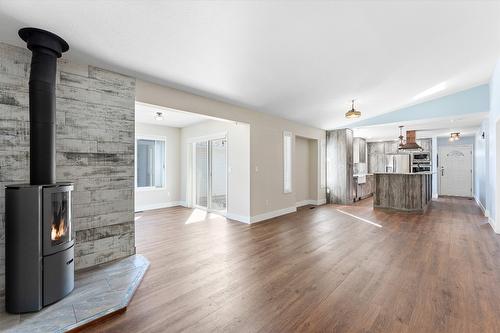 57 Kingfisher Drive, Penticton, BC - Indoor Photo Showing Living Room With Fireplace