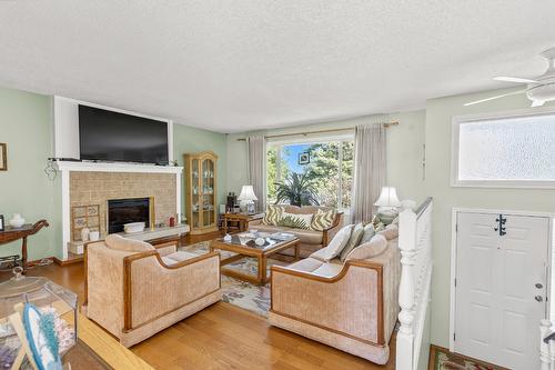 669 Paret Place, Kelowna, BC - Indoor Photo Showing Living Room With Fireplace