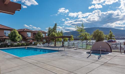 404-7600 Cottonwood Drive, Osoyoos, BC - Outdoor With In Ground Pool