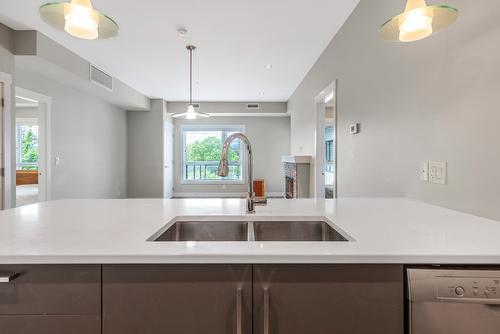 405-1883 Water Street, Kelowna, BC - Indoor Photo Showing Kitchen With Double Sink