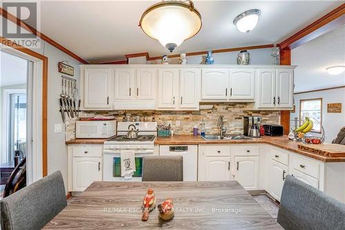 395 - 3033 Townline Road, Fort Erie, ON - Indoor Photo Showing Kitchen With Double Sink