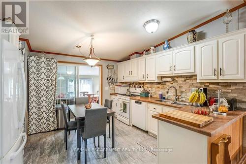 395 - 3033 Townline Road, Fort Erie, ON - Indoor Photo Showing Kitchen With Double Sink