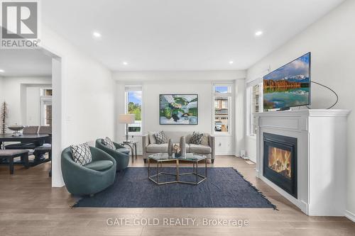 2560 Bandsman Crescent, Oshawa (Windfields), ON - Indoor Photo Showing Living Room With Fireplace