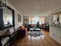 417 - 5 Parkway Forest Drive, Toronto (Henry Farm), ON  - Indoor Photo Showing Living Room 