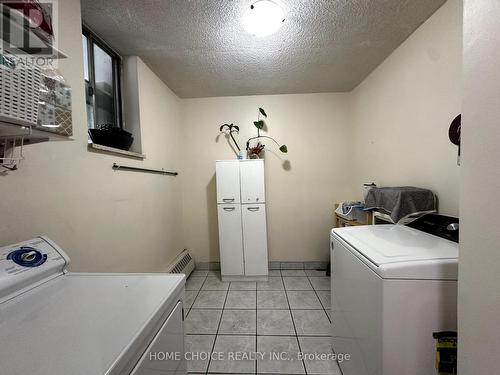 417 - 5 Parkway Forest Drive, Toronto (Henry Farm), ON - Indoor Photo Showing Laundry Room