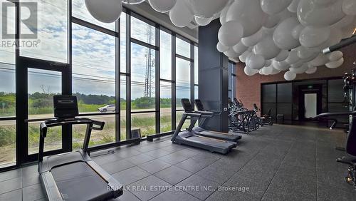 601 - 3220 William Coltson Avenue, Oakville, ON - Indoor Photo Showing Gym Room