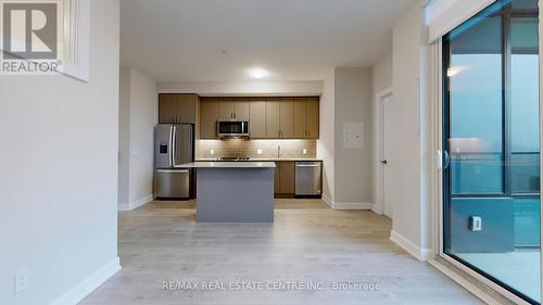 601 - 3220 William Coltson Avenue, Oakville, ON - Indoor Photo Showing Kitchen