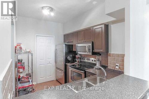 Ph207 - 8 Lee Centre Drive, Toronto (Woburn), ON - Indoor Photo Showing Kitchen With Double Sink