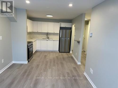 6 - 19 Church Street N, New Tecumseth (Alliston), ON - Indoor Photo Showing Kitchen With Double Sink