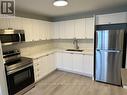 6 - 19 Church Street N, New Tecumseth (Alliston), ON  - Indoor Photo Showing Kitchen With Stainless Steel Kitchen With Double Sink 