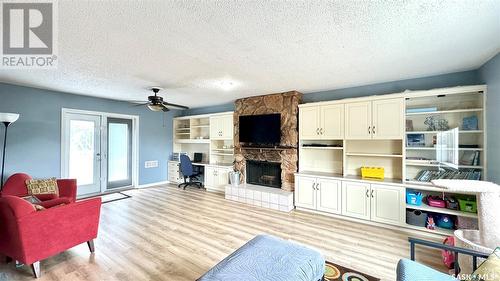 East Davidson Acreage, Arm River Rm No. 252, SK - Indoor Photo Showing Living Room With Fireplace