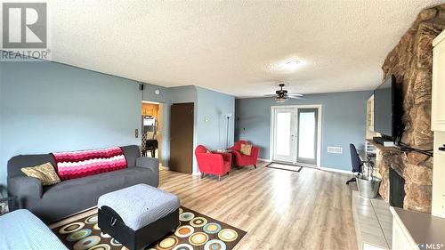 East Davidson Acreage, Arm River Rm No. 252, SK - Indoor Photo Showing Living Room With Fireplace