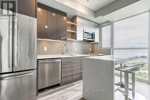 2611 - 33 Shore Breeze Drive, Toronto (Mimico), ON - Indoor Photo Showing Kitchen With Upgraded Kitchen