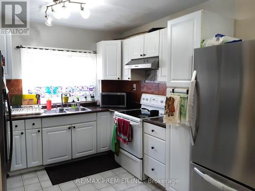 7 - 61 Driftwood Avenue, Toronto (Glenfield-Jane Heights), ON - Indoor Photo Showing Kitchen With Double Sink