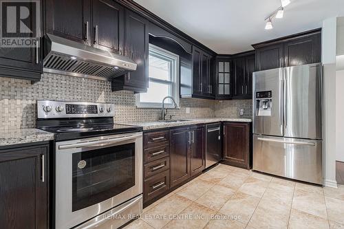 24 Duncairn Drive, Toronto (Princess-Rosethorn), ON - Indoor Photo Showing Kitchen With Upgraded Kitchen