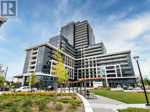 818 - 3220 William Coltson Avenue, Oakville, ON - Outdoor With Balcony With Facade