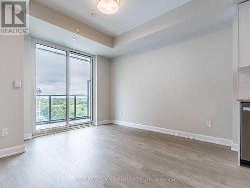 818 - 3220 William Coltson Avenue, Oakville, ON - Indoor Photo Showing Other Room With Fireplace