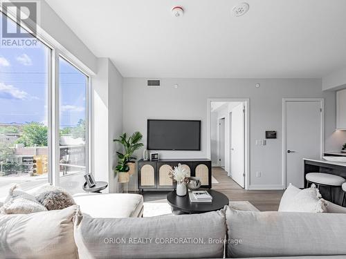 220 - 201 Brock Street S, Whitby (Downtown Whitby), ON - Indoor Photo Showing Living Room