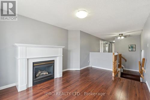 13 Black Cherry Crescent, Barrie (Holly), ON - Indoor Photo Showing Living Room With Fireplace