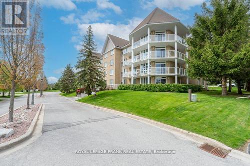 209 - 51 Rivermill Boulevard, Kawartha Lakes (Lindsay), ON - Outdoor With Balcony With Facade