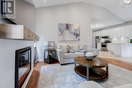 46 Irwin Crescent, New Tecumseth, ON - Indoor Photo Showing Living Room With Fireplace