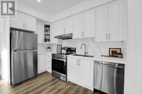 125 - 3050 Erin Centre Boulevard, Mississauga (Churchill Meadows), ON - Indoor Photo Showing Kitchen With Double Sink