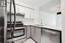 418 - 942 Yonge Street, Toronto (Annex), ON  - Indoor Photo Showing Kitchen With Double Sink 