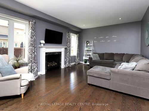 557 Daniel Clarke Way, Oakville, ON - Indoor Photo Showing Living Room With Fireplace