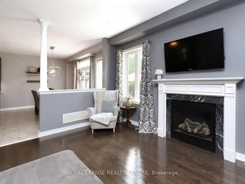 557 Daniel Clarke Way, Oakville, ON - Indoor Photo Showing Living Room With Fireplace