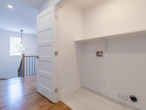 Laundry room - 6780 Rue Baillargeon, Brossard, QC - Indoor Photo Showing Other Room