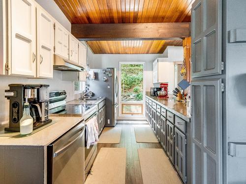 2408 11Th Avenue, Castlegar, BC - Indoor Photo Showing Kitchen With Double Sink