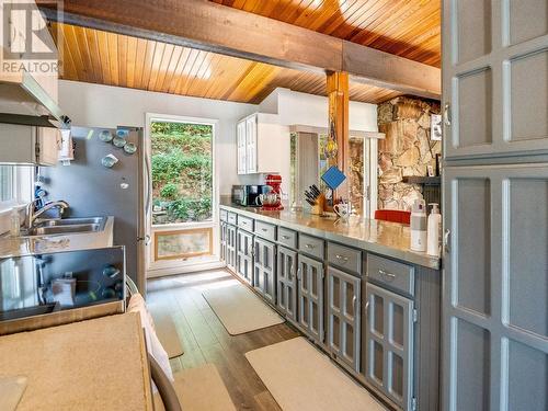 2408 11Th Avenue, Castlegar, BC - Indoor Photo Showing Kitchen With Double Sink