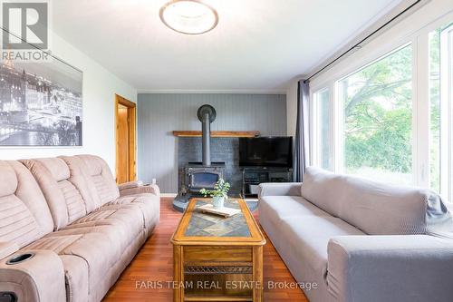 6582 Yonge Street, Innisfil, ON - Indoor Photo Showing Living Room With Fireplace