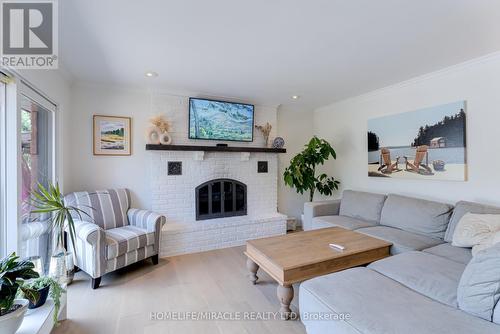 71 Nicholson Crescent, Springwater (Minesing), ON - Indoor Photo Showing Living Room With Fireplace