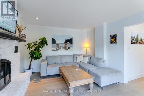 71 Nicholson Crescent, Springwater (Minesing), ON - Indoor Photo Showing Living Room With Fireplace