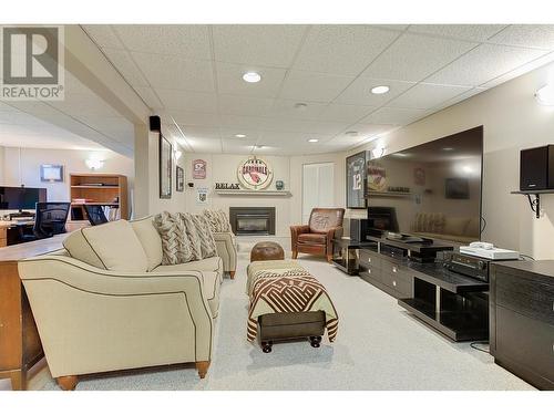 878 Roma Court, Kelowna, BC - Indoor Photo Showing Living Room With Fireplace