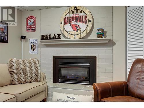 878 Roma Court, Kelowna, BC - Indoor Photo Showing Living Room With Fireplace