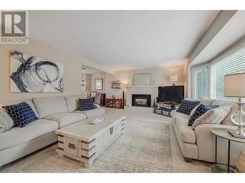 878 Roma Court, Kelowna, BC - Indoor Photo Showing Living Room With Fireplace