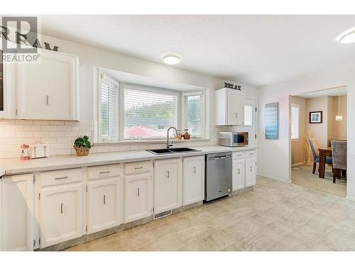 878 Roma Court, Kelowna, BC - Indoor Photo Showing Kitchen With Double Sink