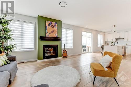 726 Cappamore Drive, Ottawa, ON - Indoor Photo Showing Living Room With Fireplace