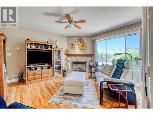 43 Kingfisher Drive, Penticton, BC - Indoor Photo Showing Living Room With Fireplace