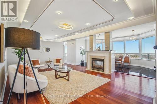 2903 - 35 Kingsbridge Garden Circle, Mississauga (Hurontario), ON - Indoor Photo Showing Living Room With Fireplace