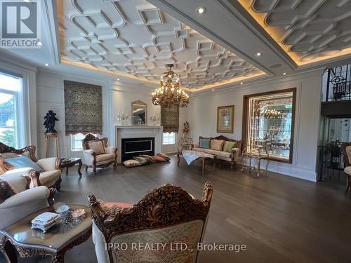 52B Citation Drive, Toronto, ON - Indoor Photo Showing Living Room With Fireplace