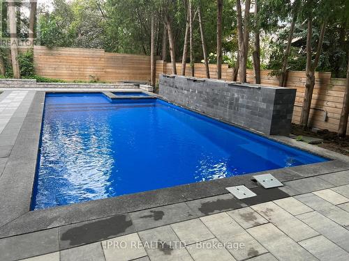 52B Citation Drive, Toronto, ON - Outdoor With In Ground Pool