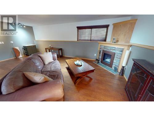 2087 3 Highway, Fernie, BC - Indoor Photo Showing Living Room With Fireplace