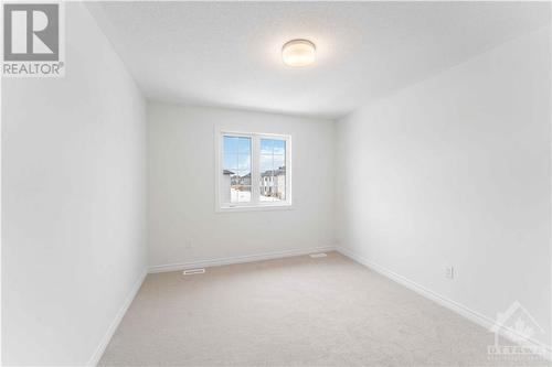 Bedroom 2 - 653 Persimmon Way, Ottawa, ON - Indoor Photo Showing Other Room