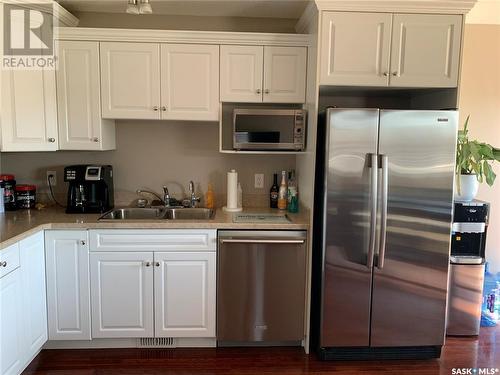 104 2201 Newcombe Drive, Estevan, SK - Indoor Photo Showing Kitchen With Stainless Steel Kitchen With Double Sink