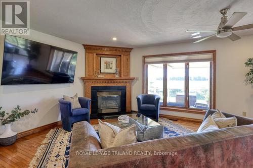 6325 Dundas Street, Thames Centre, ON - Indoor Photo Showing Living Room With Fireplace