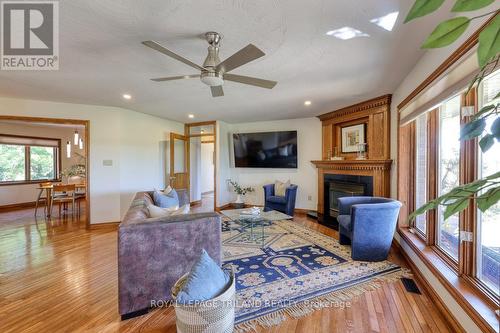 6325 Dundas Street, Thames Centre, ON - Indoor Photo Showing Living Room With Fireplace