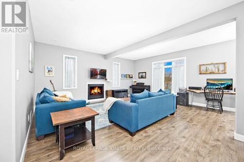 1455 Berkshire Drive, Kingston, ON - Indoor Photo Showing Living Room With Fireplace